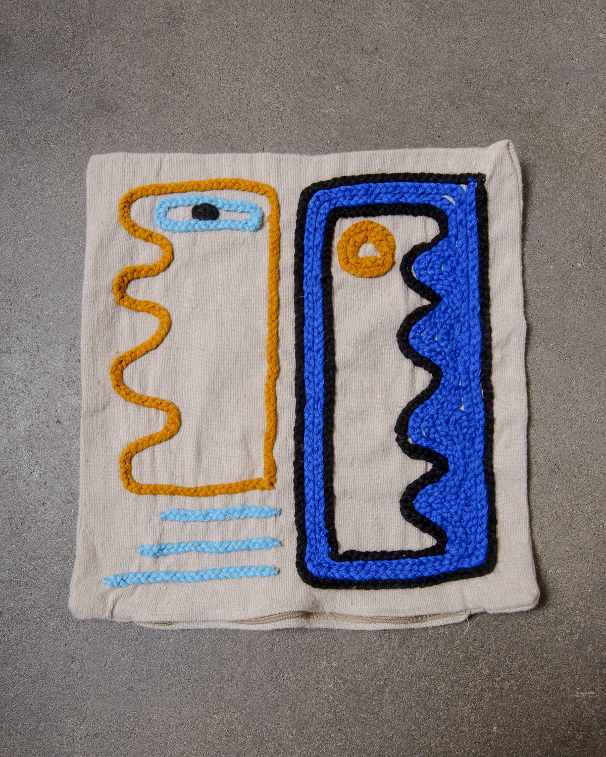 Handcrafted cushion cover from Morocco. Soft Wool cushion with modern, embroidered design.